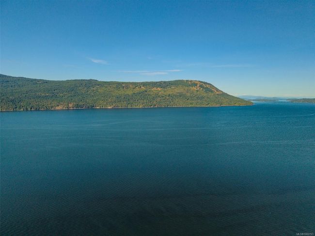 Water view featuring a mountain backdrop | Image 98
