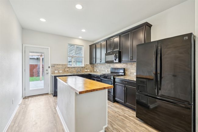 397 Bayberry Cir, House other with 3 bedrooms, 2 bathrooms and null parking in Buda TX | Image 13