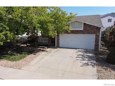 1160 Trout Creek Circle, House other with 3 bedrooms, 2 bathrooms and 2 parking in Longmont CO | Image 1