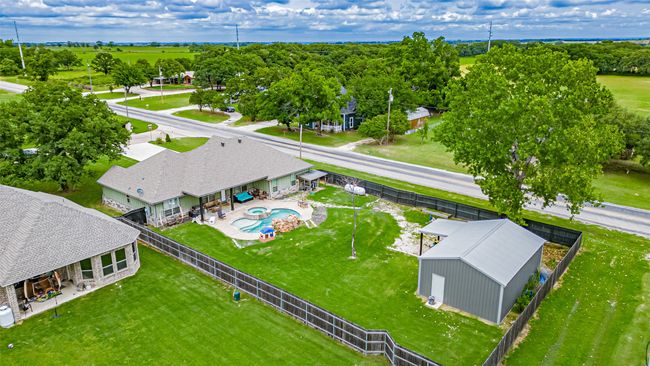 Aerial view of a pool, yard & shop building | Image 29