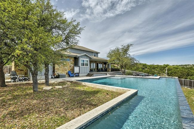 A negative edge allows you to swim right up to the view for an up close and personal look. Intelligently designed pool allows for lap swimming, as well. | Image 32