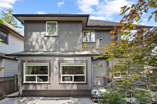 Back of house with stucco siding | Image 31