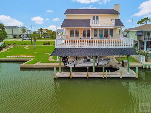 1327 Tiki Dr, Tiki Island, TX, 77554-8126 | Card Image