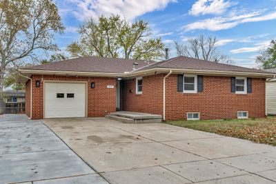 Ranch-style home with a garage | Image 2