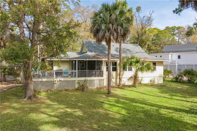 Spacious backyard and back porches of home, screen in lanai and seperate open air porch | Image 8