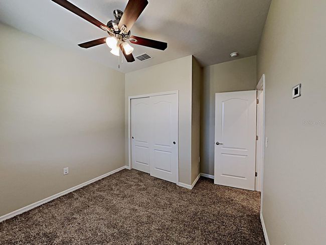 7603 Pool Compass Loop, House other with 4 bedrooms, 3 bathrooms and null parking in Wesley Chapel FL | Image 8