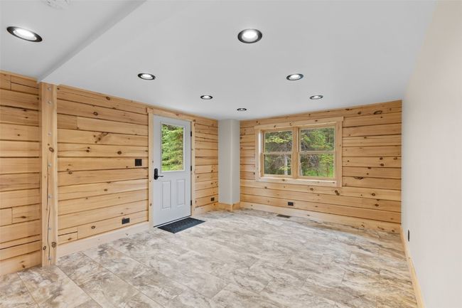 main floor with exit to back side of home | Image 23