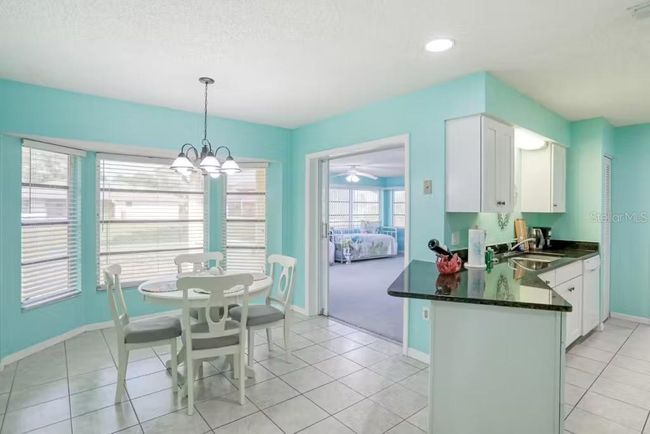 Many windows to fenced yard | Image 9
