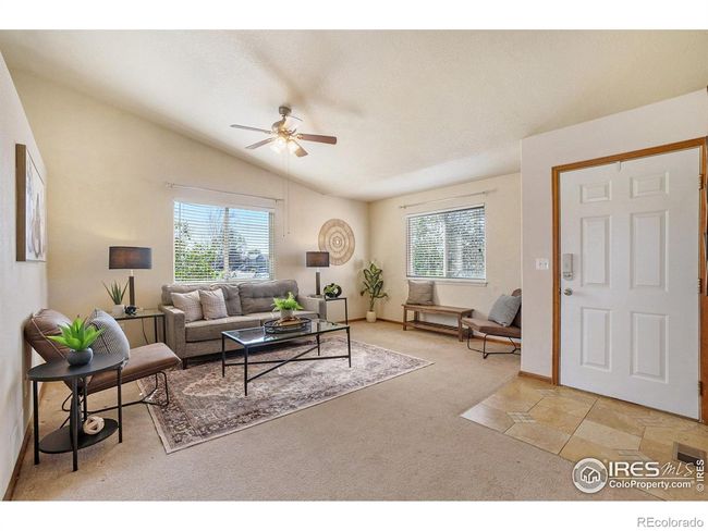 Living room with vaulted ceilings | Image 4