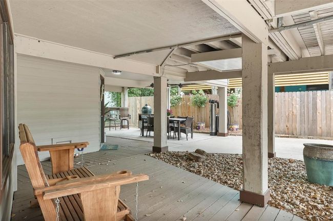 Welcome Home, entry to the home and view of covered area under home. | Image 5