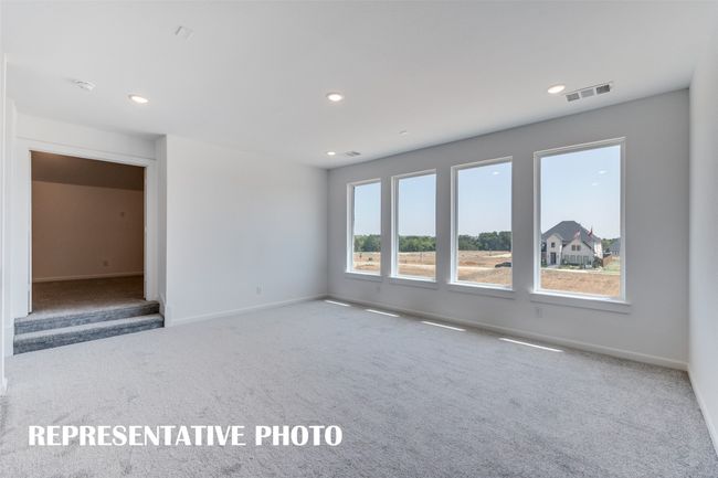 The light filled game room with adjacent media room is the perfect place to host those big game day parties. REPRESENTATIVE PHOTO | Image 15