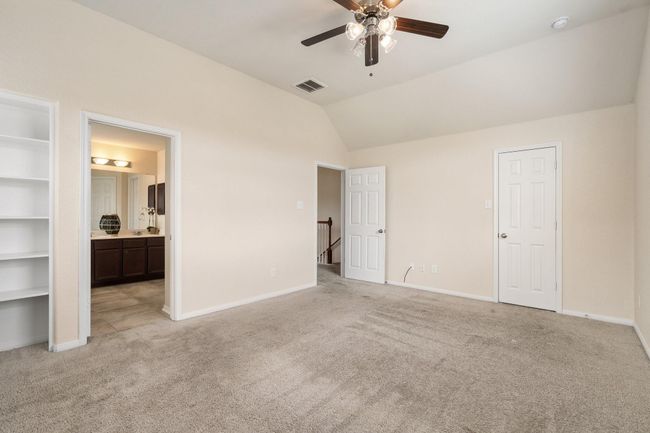 primary bedroom has 2 walk-in closets | Image 21