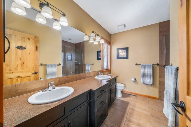 158 Hubman Landing, Home with 4 bedrooms, 3 bathrooms and 4 parking in Canmore AB | Image 15