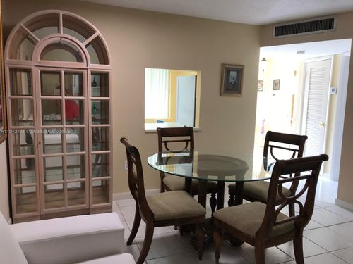g113-1201 Ne 191st St, Miami, FL, 33179-4094 | Card Image