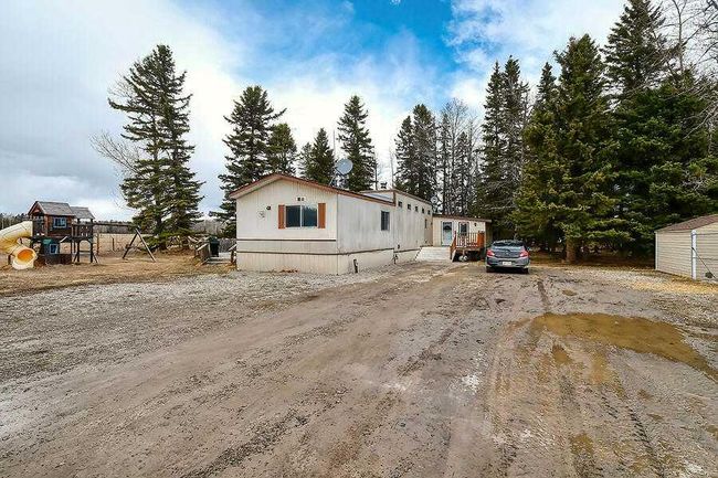 33122 Range Road 50, Home with 4 bedrooms, 2 bathrooms and null parking in Sundre AB | Image 2