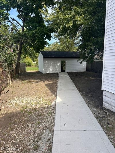 View of yard featuring a storage shed | Image 3