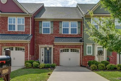 Beautiful brick front with easy garage access | Image 1