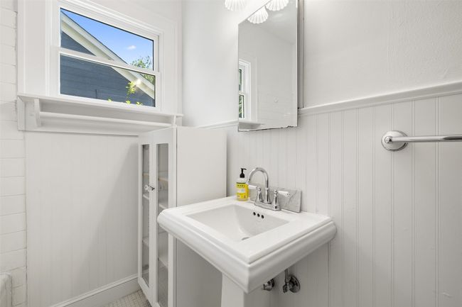 Bathroom featuring wainscoting and a sink | Image 21