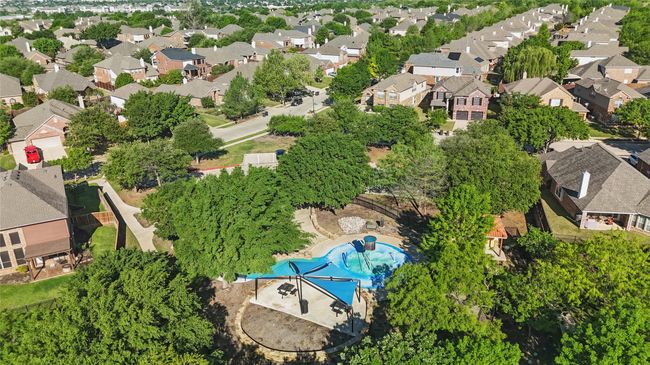 Aerial perspective of suburban area featuring a pool | Image 38