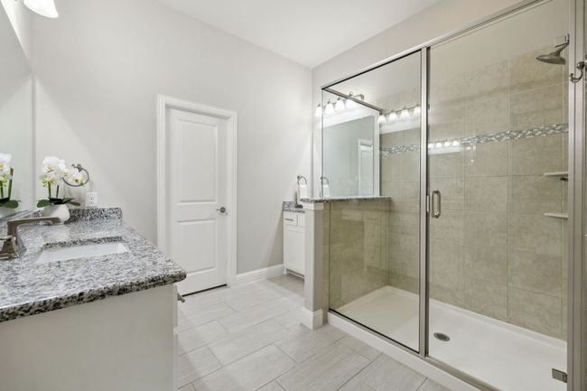 Bathroom featuring vanity and a shower stall | Image 22