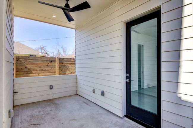 Covered patio between the garage/flex room and the kitchen is plumbed with natural gas to allow for an entertainer's dream outdoor kitchen. | Image 16