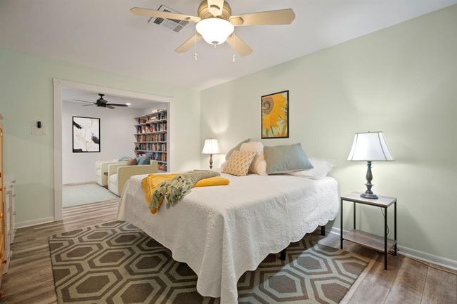 Primary bedroom complete with bonus nook and access to the back patio. | Image 14