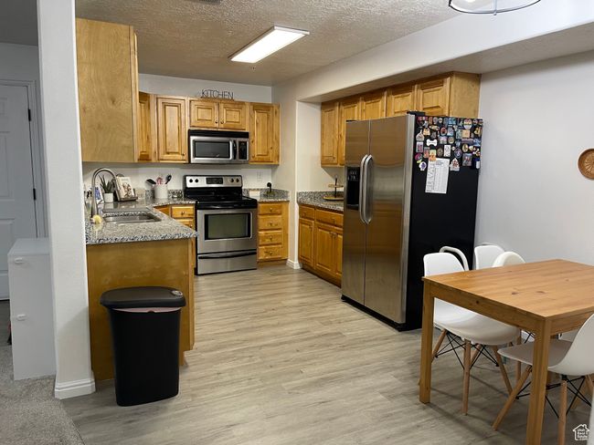 Abundant cabinetry and storage for kitchen sundries and appliances. | Image 7