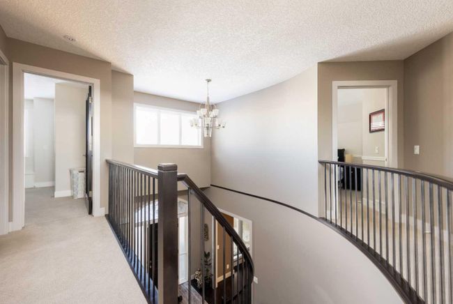 67 Tusslewood View Nw, Home with 4 bedrooms, 3 bathrooms and 4 parking in Calgary AB | Image 5