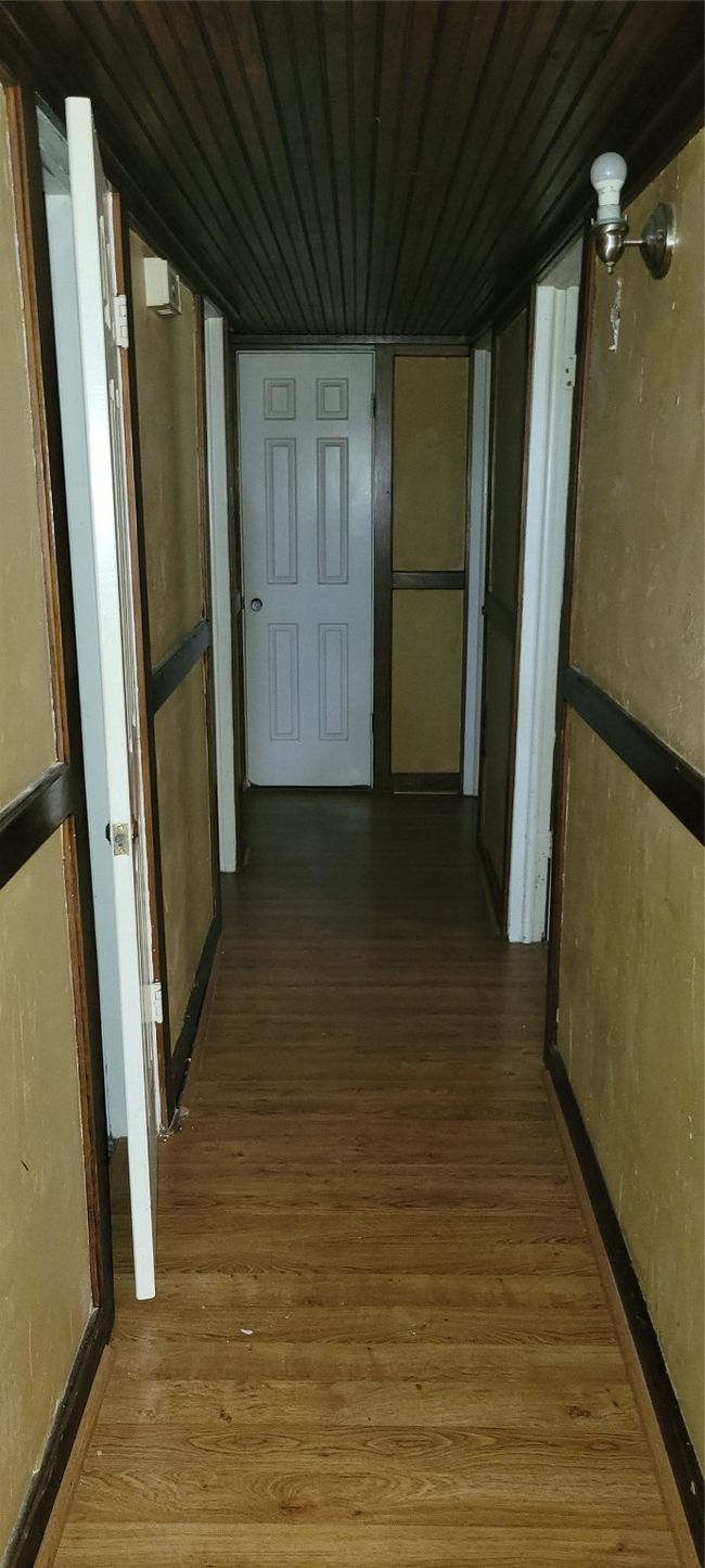 Corridor featuring wood finished floors and wood ceiling | Image 12