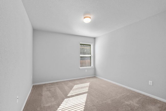 Unfurnished room with baseboards and carpet | Image 22