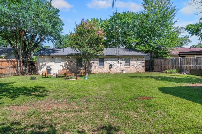 Rear view of house featuring brick siding | Image 22