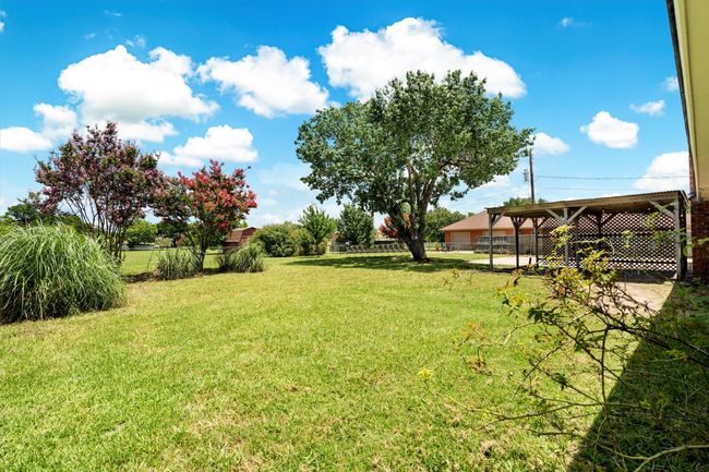 large, fenced yard | Image 26