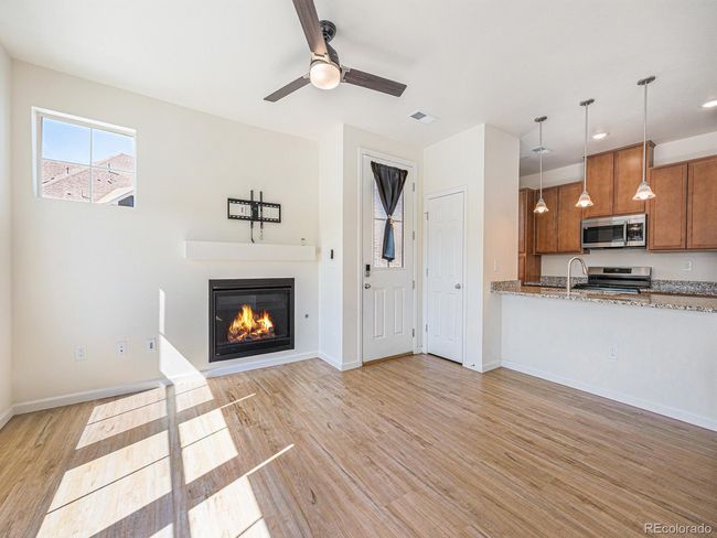 E - 5755 S Buchanan Ct, House attached with 2 bedrooms, 1 bathrooms and null parking in Aurora CO | Image 5