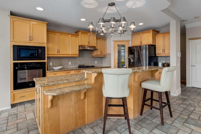 191 Sienna Park Drive Sw, House other with 4 bedrooms, 4 bathrooms and 4 parking in Calgary AB | Image 6