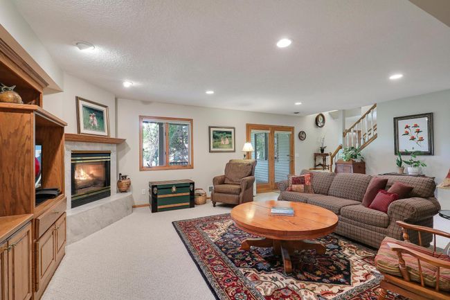 Great lighting in this lower level room. | Image 34