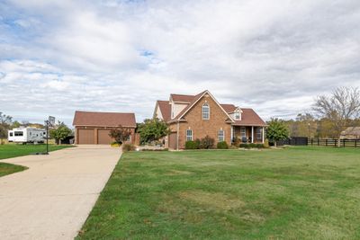 Brick Home on 3.27 acres. Home has pasture on right side that allows for Livestock fully fenced. | Image 1