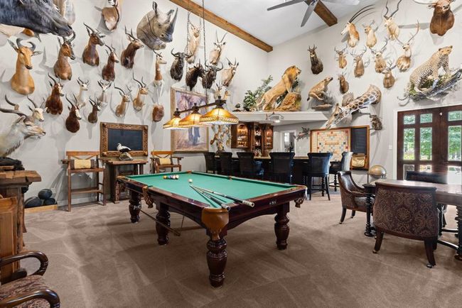 If you are exotic game hunter, look no further! This was specifically designed for an up-scale trophy room. The walls are reinforced and skinned with OSB plywood behind the sheetrock, so you can hang anything anywhere - no need to located a stud as the entire wall is your canvas! | Image 28