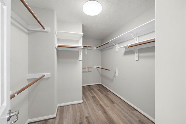 Primary walk-in closet | Image 25