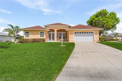 1401 Sw 52nd Lane, House other with 3 bedrooms, 2 bathrooms and null parking in Cape Coral FL | Image 1