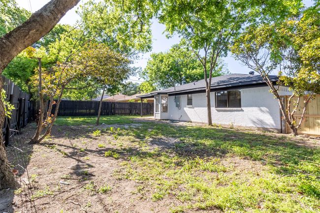 View of yard with a fenced backyard | Image 29