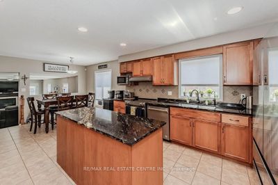 39 Ingram Dr, House other with 3 bedrooms, 4 bathrooms and 4 parking in Guelph ON | Image 3