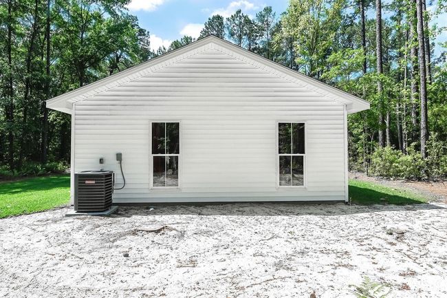 Back of property with central AC unit | Image 23
