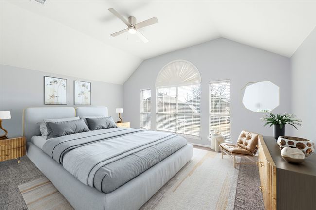 Bedroom featuring carpet, visible vents, vaulted ceiling, and ceiling fan | Image 13