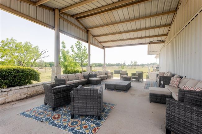 Enjoy peaceful patio sitting or use this as a covered drive for the sanctuary building. | Image 4