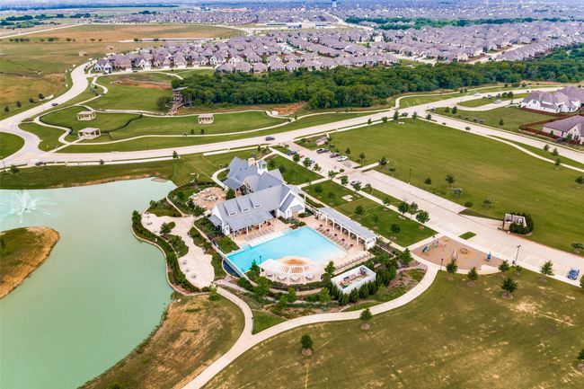 Club house and large pool for those hot summer days! You have your own resort amenities within minutes of your house. | Image 37