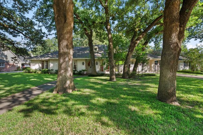 Single story home featuring a front yard | Image 37