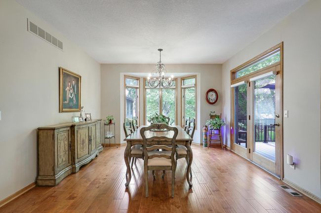 Spacious dining area to accommodate side tables and extra chairs. | Image 11