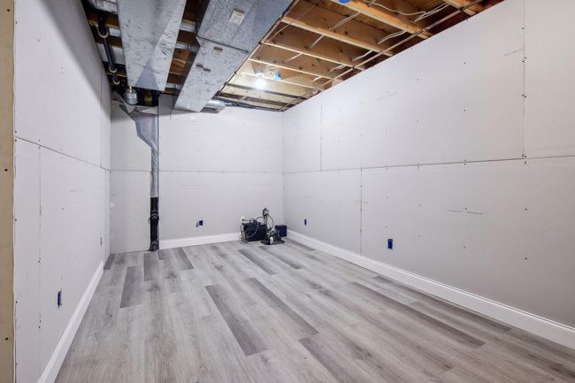 The lower level 3/4 bath has a designer vanity | Image 27