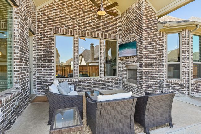 View of patio / terrace featuring ceiling fan | Image 39