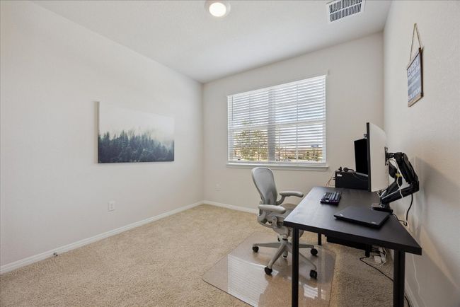 Carpeted office space with baseboards | Image 7